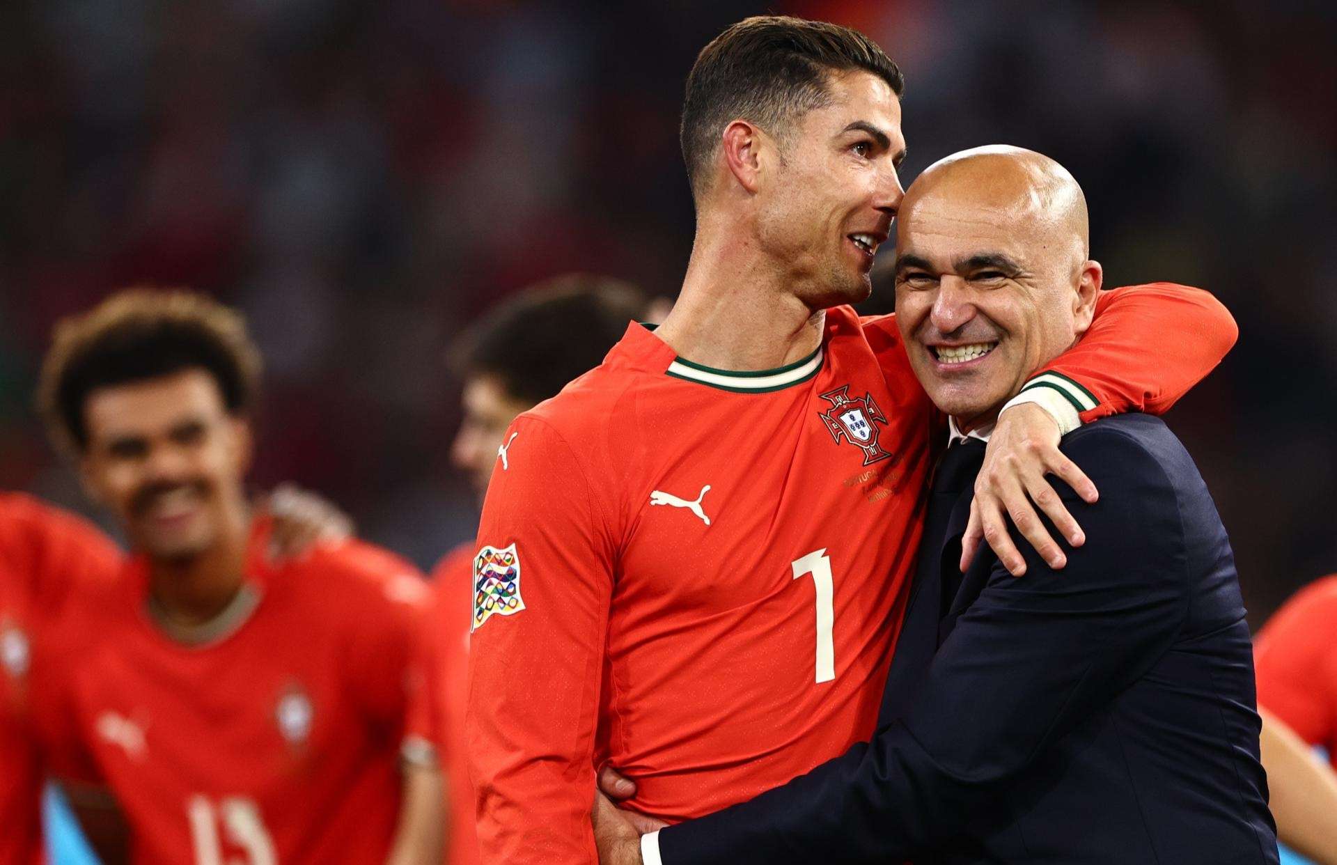 Cristiano Ronaldo y Roberto Martínez.